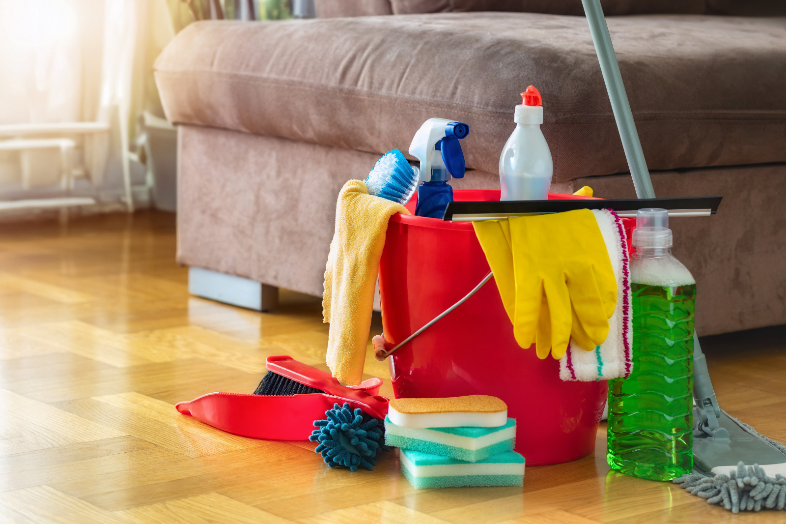 Wood Floor Sanding in eastbarnet – cleaning a restored oak herringbone parquet living room floor with household supplies and aftercare products.
