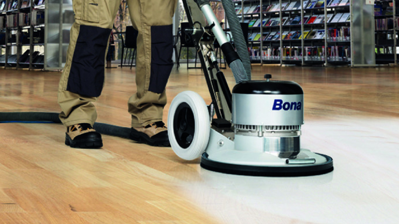 Hardwood Floor Sanding in eastbarnet on an oak hardwood commercial floor using a professional Bona dust-free sanding machine.